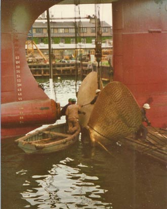 Preparing to lift out of the water with shore crane