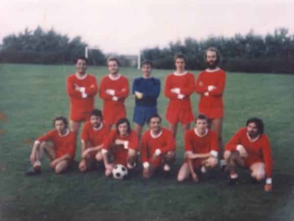 Officers in football kit