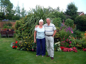 Al & Jan in their garden