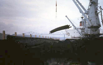 Loading deck cargo of deck pilings