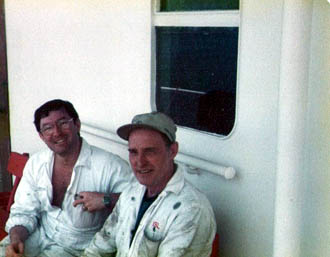 Two engineers in boiler suits